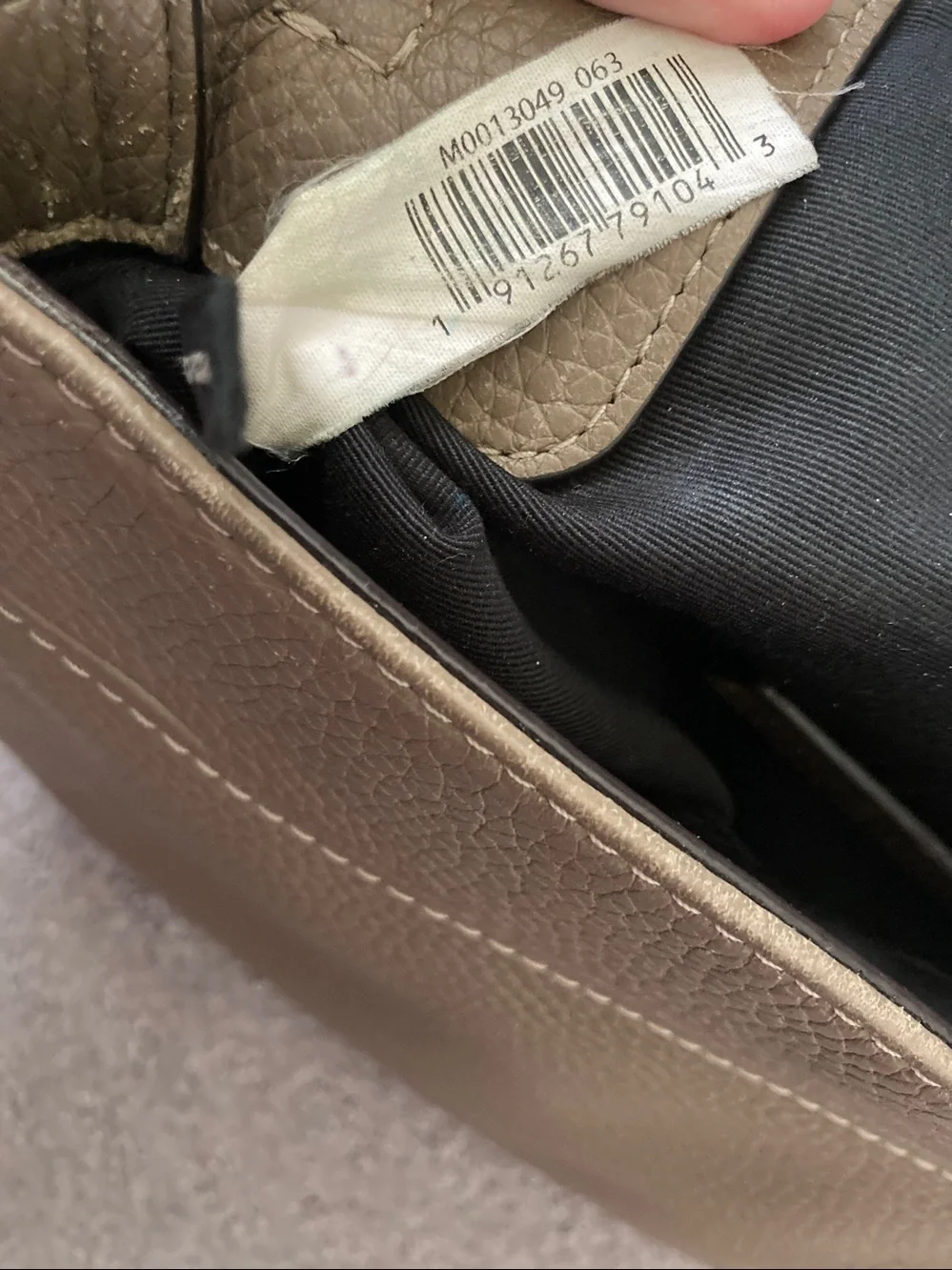 Marc Jacobs taupe leather crossbody bag.